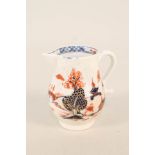 A Lowestoft sparrow beak jug with dolls house pattern, gritty finish to touch,