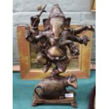 An Indian bronze of Ganesh standing on a rat,