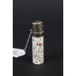 A pretty scent bottle with ceramic body and white metal lid,