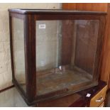 An oak glazed table top display case