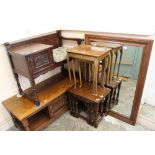 An Old Charm nest of three oak tables, one other nest of tables,