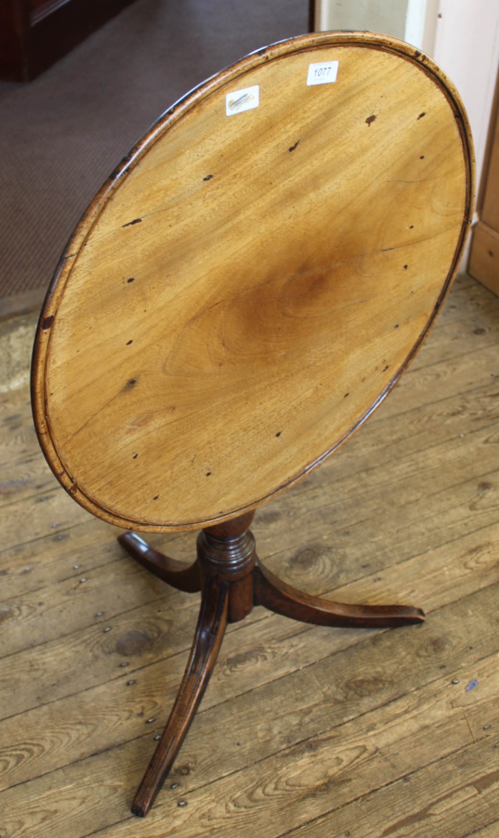 A 19th Century mahogany tilt top round table