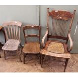 A bentwood armchair and two other cottage elm and beech chairs