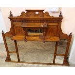 An Edwardian oak overmantel mirror