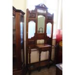 A substantial Edwardian mahogany hall stand with tile back,