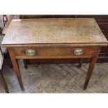 A 19th Century oak tea table with single drawer and original handles