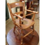 An Edwardian elm child's chair