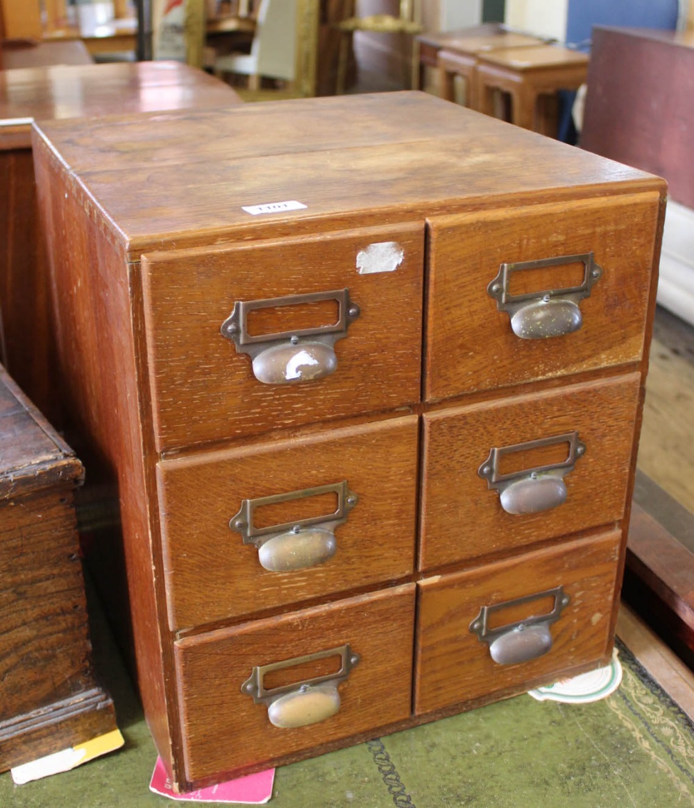 A 1920's oak bank of six drawers,