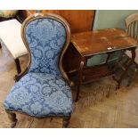 An Edwardian occasional table with galleried under tier and a Victorian upholstered balloon back