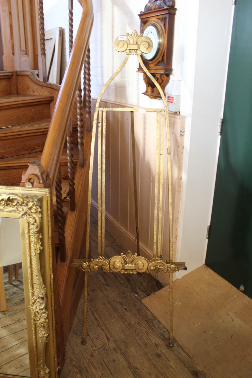 A large gilt metal artist's easel