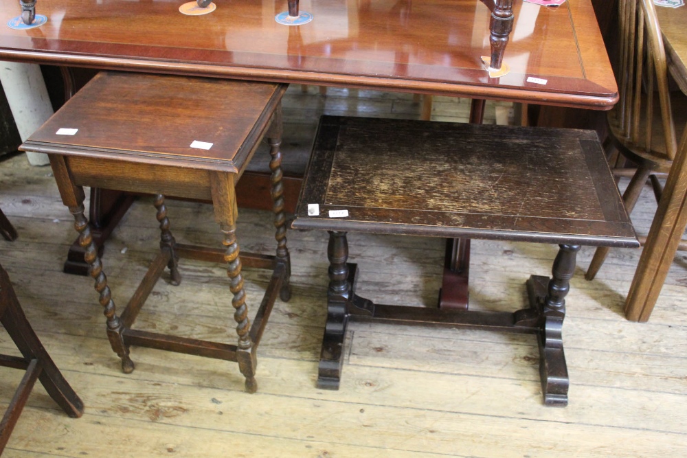 An oak reproduction occasional table with stretcher base and one other barley twist oak table