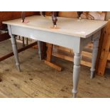 An Edwardian painted pine dining table