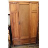 An Edwardian satinwood single wardrobe with single drawer below