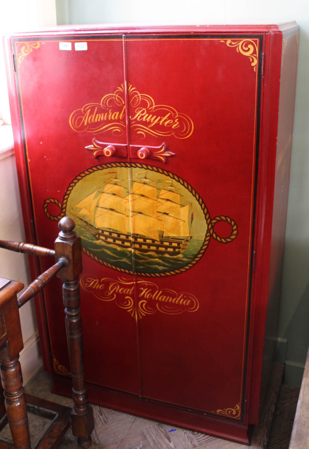 A hand painted child's wardrobe with Battle of Sole Bay decoration