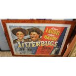 A maple framed and glazed print of film poster for Laurel and Hardy in Jitterbugs