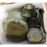 A quantity of various military items including head wear,