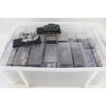 A large quantity of perspex cased tanks and military vehicles