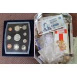 A cased 2001 coin set to £5 and other coins plus two Scottish £10 and one £5 note