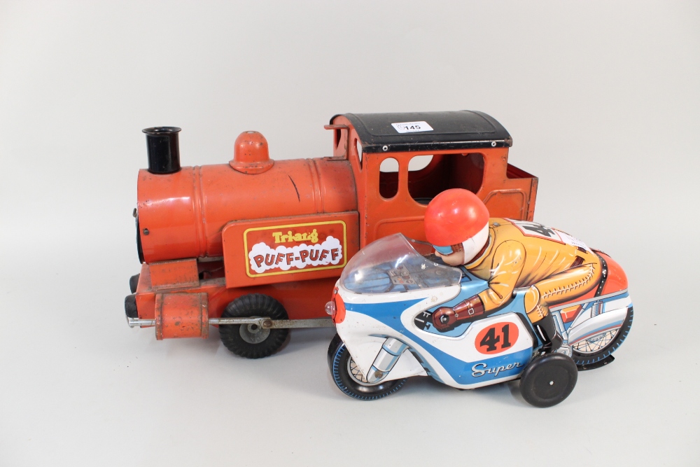 A Triang tin plate puff puff loco plus a tin plate motorcycle