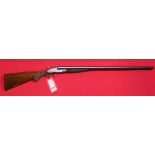 An English 12 bore S/S S/L/N/E shotgun with 30 1/4" barrels, retailed by W.H.