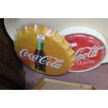 A Coca Cola tin plate button plus quartz clocks