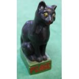 A black ceramic cat,
