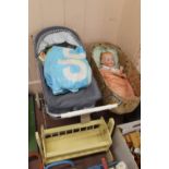 A 'classic' dolls pram and vinyl doll plus clothes and a wooden cradle