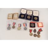 Various military related sporting medallions including an N.R.A.