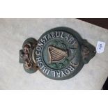 A large cast metal 'Royal Irish Constabulary' painted badge/plaque