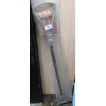 An 'as new' English saddle leather shooting stick in original packing