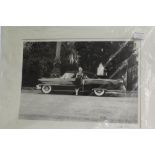 A limited edition print of Marilyn Monroe with 1954 Cadillac photograph by Milton Greene,