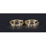 A pair of 18ct gold hoop earrings, each set with five brilliant cut diamonds,