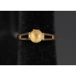 A lady's 9ct gold ring set with citrine,