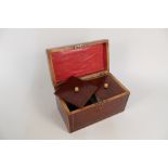 A 19th Century inlaid mahogany two compartment tea caddy