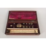 A Sikes hydrometer in inlaid mahogany case