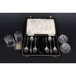 A set of six silver teaspoons and tongs,