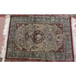 A silk floral prayer rug,