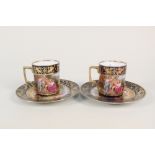 A pair of Vienna figure decorated cabinet cups and saucers