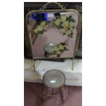 A brass and floral mirror painted fire screen plus a circular elm stool
