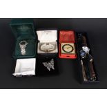 A box of various gents and ladies wristwatches plus an Ingersoll clock in red case