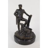 A bronze of a hunter and dog after Moreau,