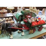 A Watneys beer cart and horse plus two German porcelain figurines