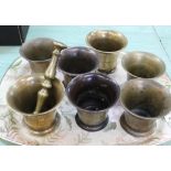 Seven antique brass and bronze mortars,