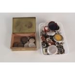 A box and tin containing watches,