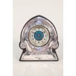 A silver clad Art Nouveau clock with turquoise enamel dial,