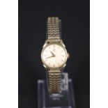 A lady's gold plated Omega wristwatch and a gilt metal pendant watch marked Lugano