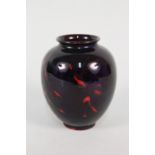 A Royal Doulton mauve and red flecked vase