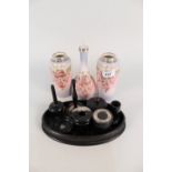 Three floral silver rim vases plus a silver mounted ebony dressing table set