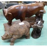 A large carved wooden bull,