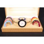A lady's vintage Gucci wristwatch on yellow metal bracelet with interchangeable coloured bezels,